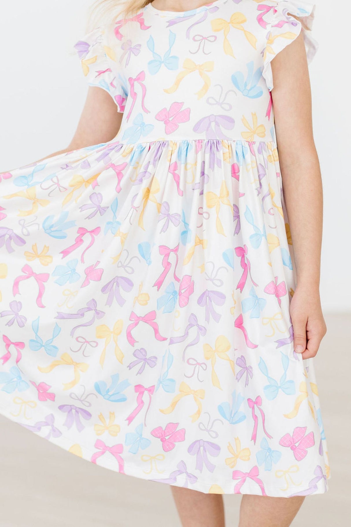 Bow-tastic Flutter Sleeve Twirl Dress