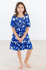 Feathered Friends Smocked Ruffle Dress